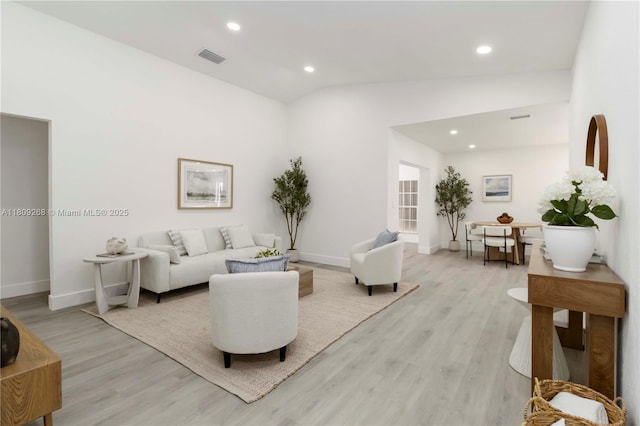 11250 SW 157th Ct, Miami, FL 33196 - living room with light wood-type flooring, recessed lighting, baseboards, and vaulted ceiling