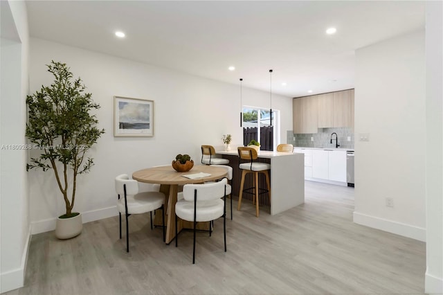 11250 SW 157th Ct, Miami, FL 33196 - dining space featuring light wood-style floors, baseboards, and recessed lighting