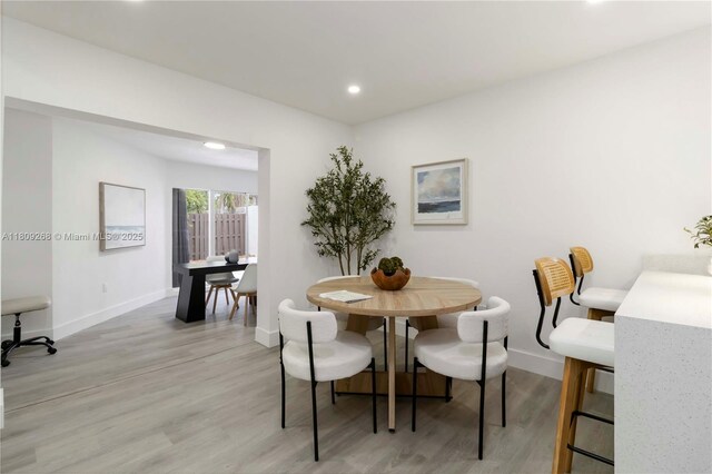 11250 SW 157th Ct, Miami, FL 33196 - dining space with baseboards, light wood-style floors, and recessed lighting