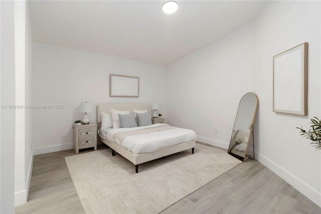 11250 SW 157th Ct, Miami, FL 33196 - bedroom with light wood-style floors and baseboards