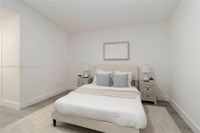 11250 SW 157th Ct, Miami, FL 33196 - bedroom with baseboards and wood finished floors