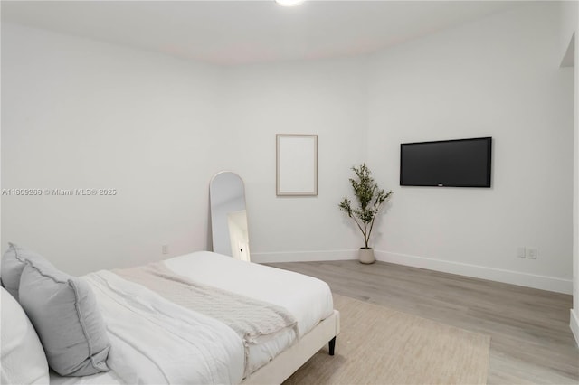 11250 SW 157th Ct, Miami, FL 33196 - bedroom featuring baseboards and wood finished floors