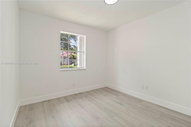 11250 SW 157th Ct, Miami, FL 33196 - unfurnished room featuring baseboards and light wood-type flooring