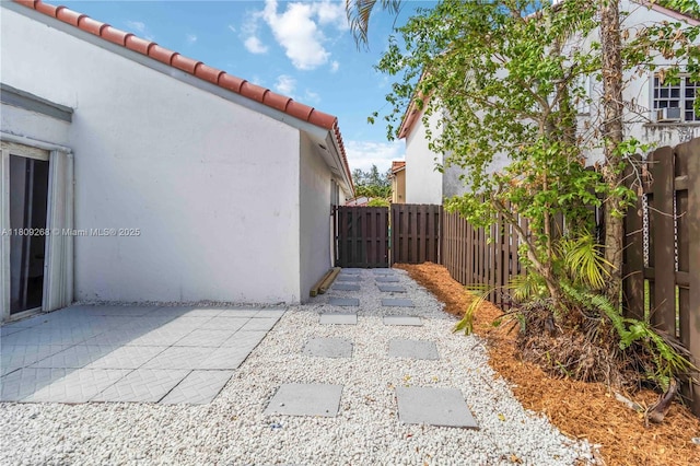 11250 SW 157th Ct, Miami, FL 33196 - fenced backyard featuring a patio