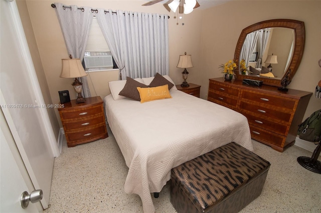 9301 SW 37th St, Miami, FL 33165 - bedroom with dark speckled floor, cooling unit, and baseboards