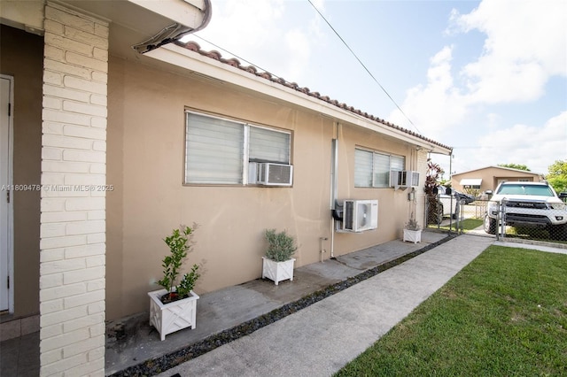 9301 SW 37th St, Miami, FL 33165 - view of side of home with stucco siding and cooling unit