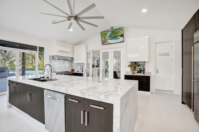 8580 Egret Lakes Ln, West Palm Beach, FL 33412 - kitchen featuring french doors, modern cabinets, white cabinets, lofted ceiling, and recessed lighting