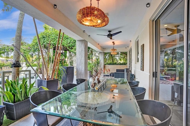 8580 Egret Lakes Ln, West Palm Beach, FL 33412 - view of patio / terrace featuring outdoor dining area and ceiling fan