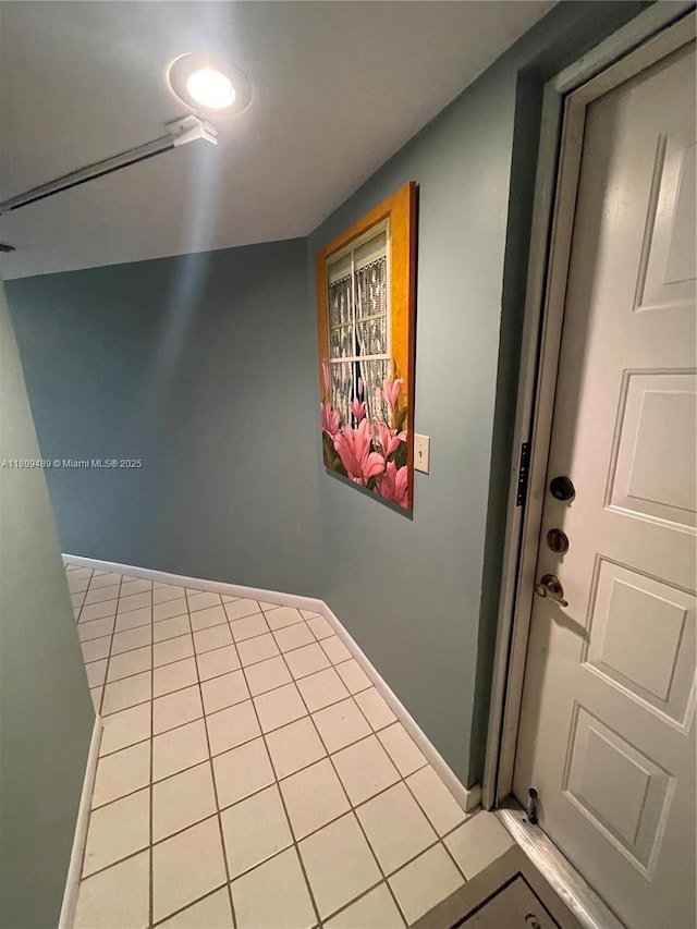 1480 Sheridan St Unit 17B, Hollywood, FL 33020 - empty room featuring light tile patterned floors and baseboards