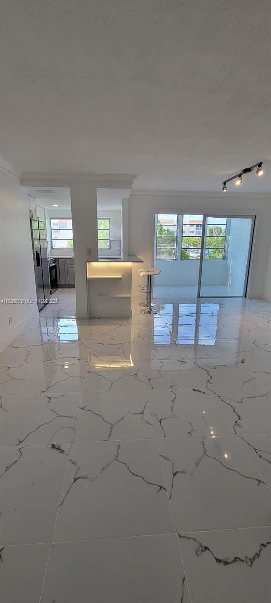 2301 NW 41st Ave Unit 209, Lauderhill, FL 33313 - empty room with light marble finish flooring