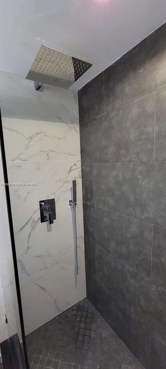 2301 NW 41st Ave Unit 209, Lauderhill, FL 33313 - bathroom with a marble finish shower
