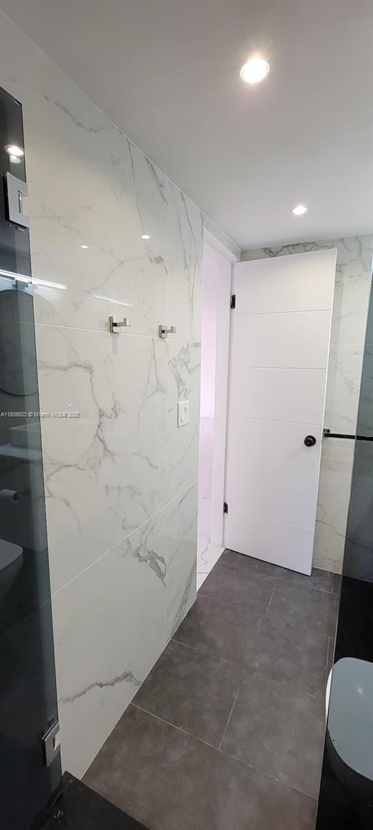 2301 NW 41st Ave Unit 209, Lauderhill, FL 33313 - bathroom featuring toilet and recessed lighting