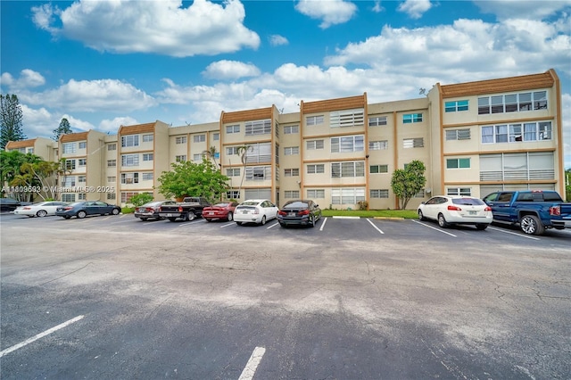 2301 NW 41st Ave Unit 209, Lauderhill, FL 33313 - view of apartment building / complex with uncovered parking