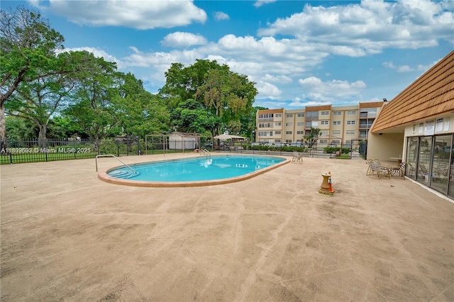 2301 NW 41st Ave Unit 209, Lauderhill, FL 33313 - community pool with a patio