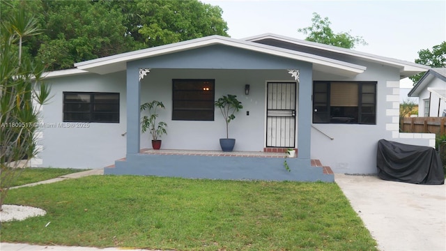 1930 NW 55th St, Miami, FL 33142 - bungalow with stucco siding and a porch