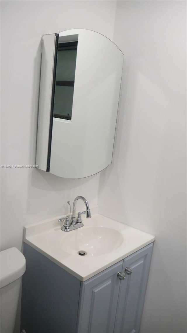 1930 NW 55th St, Miami, FL 33142 - half bathroom featuring vanity and toilet