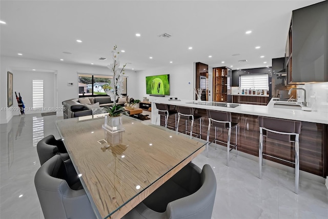 9241 SW 55th St, Cooper City, FL 33328 - dining space featuring light marble finish flooring and recessed lighting