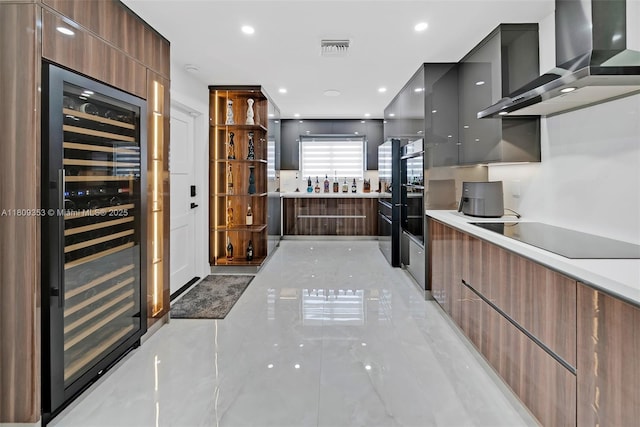 9241 SW 55th St, Cooper City, FL 33328 - kitchen featuring modern cabinets, wall chimney exhaust hood, beverage cooler, black electric cooktop, and light countertops