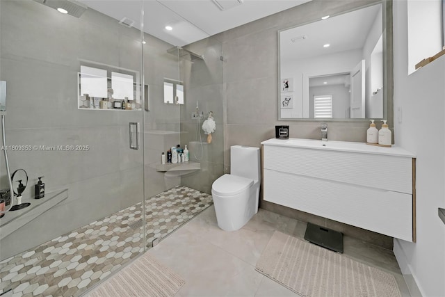 9241 SW 55th St, Cooper City, FL 33328 - full bath with a shower stall, vanity, toilet, recessed lighting, and tile walls