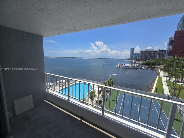 200 SE 15th Rd Unit 6B, Miami, FL 33129 - balcony with a water view and view of pool area