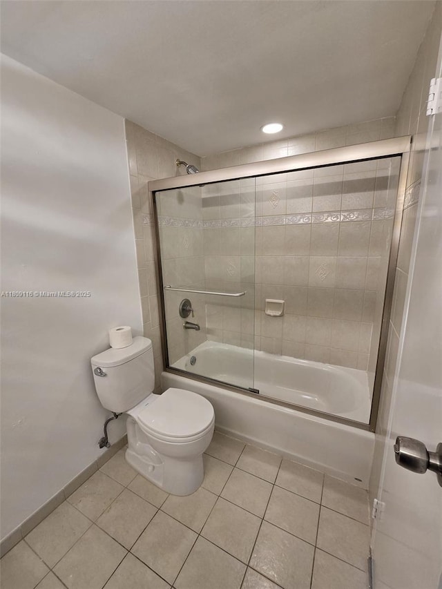 200 SE 15th Rd Unit 6B, Miami, FL 33129 - full bath featuring tile patterned flooring, toilet, and bath / shower combo with glass door