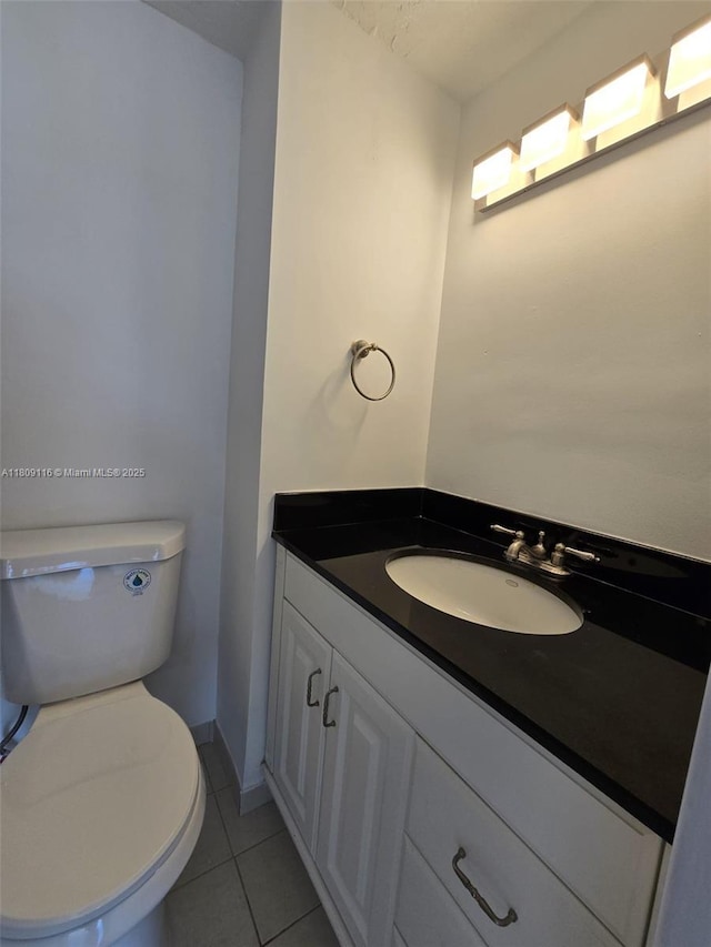 200 SE 15th Rd Unit 6B, Miami, FL 33129 - half bath featuring vanity, toilet, and tile patterned flooring