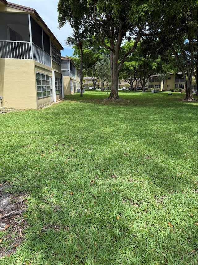 7680 NW 1st St Unit 108, Margate, FL 33063 - view of grassy yard