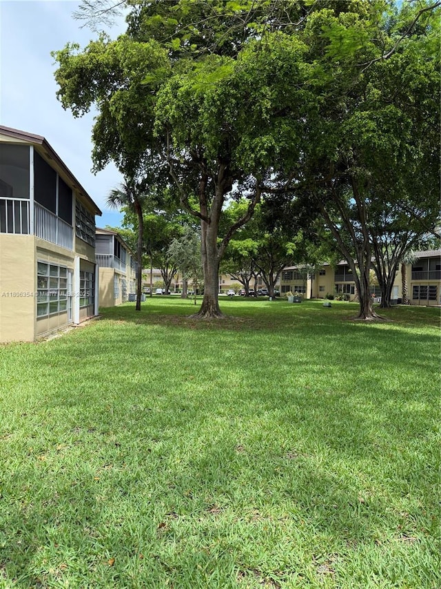 7680 NW 1st St Unit 108, Margate, FL 33063 - view of green lawn