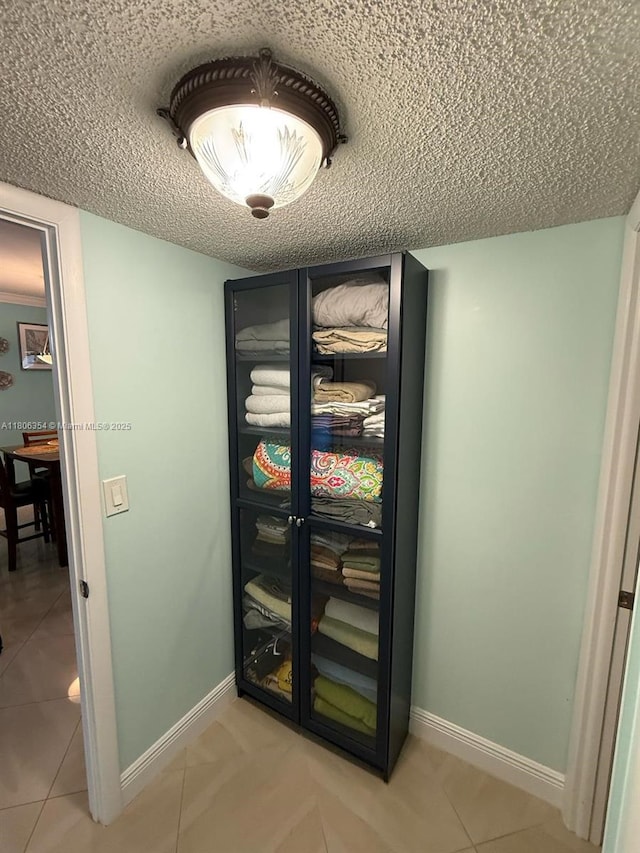 7680 NW 1st St Unit 108, Margate, FL 33063 - detailed view of a textured ceiling and baseboards
