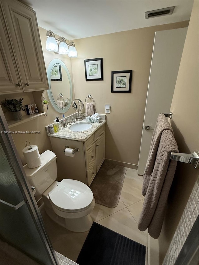 7680 NW 1st St Unit 108, Margate, FL 33063 - bathroom featuring tile patterned flooring, toilet, and vanity