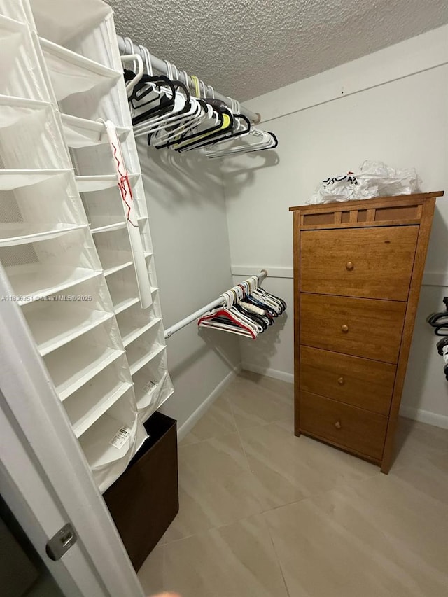 7680 NW 1st St Unit 108, Margate, FL 33063 - spacious closet with light tile patterned floors