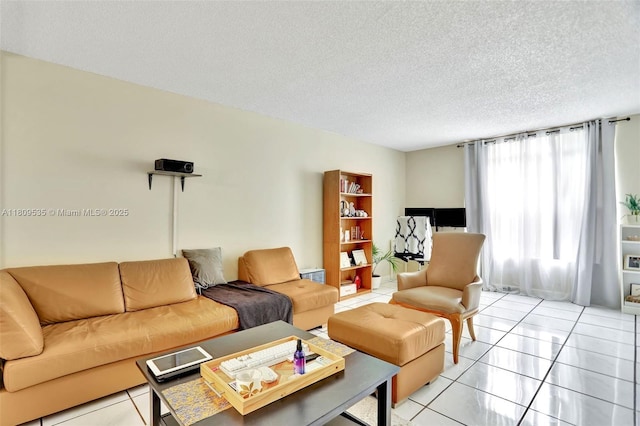 3660 Inverrary Dr Unit 2X, Lauderhill, FL 33319 - living room featuring a textured ceiling and light tile patterned floors