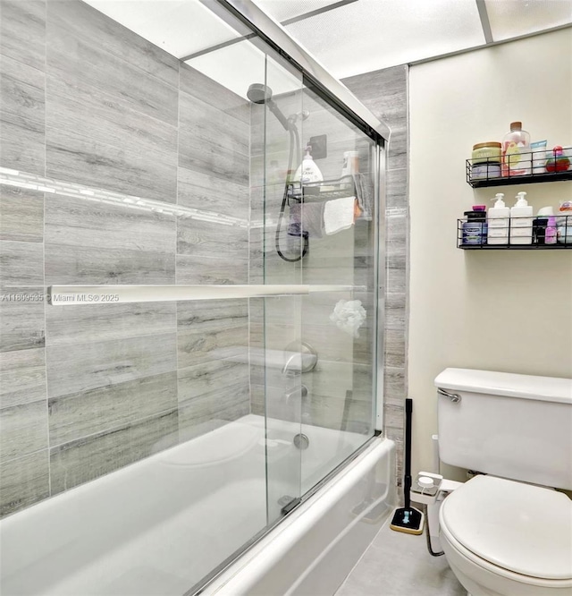 3660 Inverrary Dr Unit 2X, Lauderhill, FL 33319 - bathroom with shower / bath combination with glass door and toilet