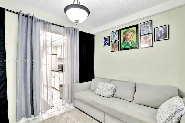 3660 Inverrary Dr Unit 2X, Lauderhill, FL 33319 - living room with a textured ceiling and light tile patterned flooring