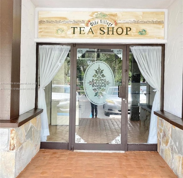 3660 Inverrary Dr Unit 2X, Lauderhill, FL 33319 - doorway to outside featuring french doors