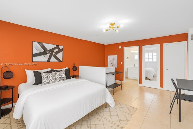 938 SW 6th St Unit 8, Miami, FL 33130 - bedroom featuring baseboards and light tile patterned floors
