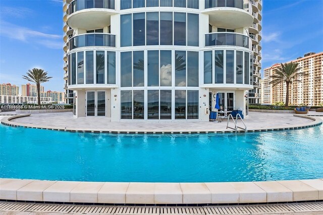 17201 Collins Ave Unit 2006, Sunny Isles Beach, FL 33160 - community pool with a patio and a view of city