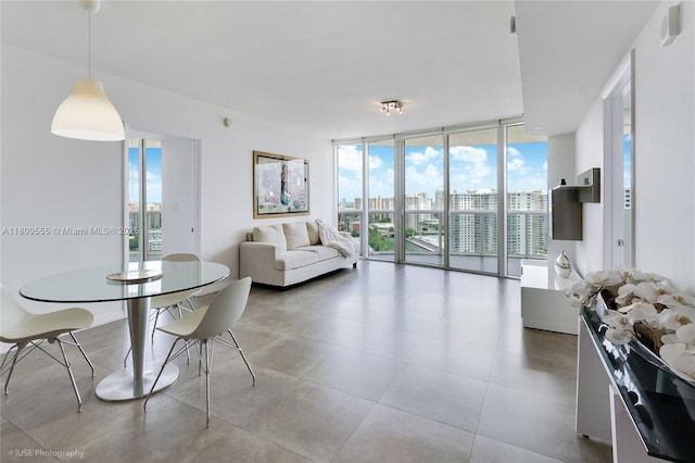 17201 Collins Ave Unit 2006, Sunny Isles Beach, FL 33160 - dining room featuring expansive windows, plenty of natural light, and a city view
