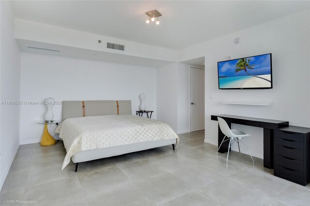 17201 Collins Ave Unit 2006, Sunny Isles Beach, FL 33160 - bedroom with baseboards and an office area