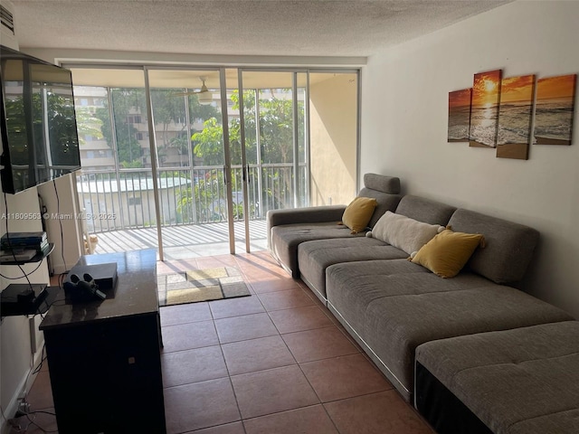 1770 NE 191st St Unit 316-1, Miami, FL 33179 - tiled living room featuring a textured ceiling