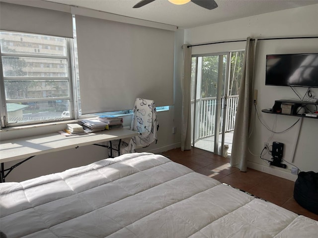 1770 NE 191st St Unit 316-1, Miami, FL 33179 - tiled bedroom with access to exterior, baseboards, and a ceiling fan