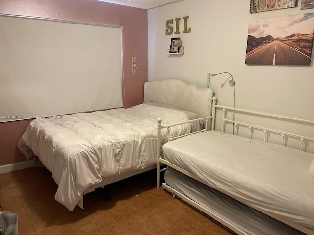 1770 NE 191st St Unit 316-1, Miami, FL 33179 - bedroom featuring tile patterned floors