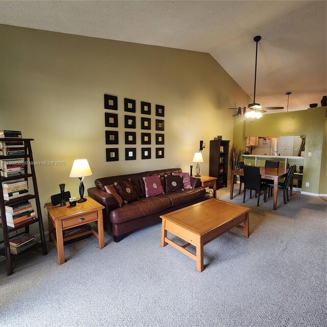 5542 Courtyard Dr Unit 5542, Margate, FL 33063 - carpeted living area featuring lofted ceiling and ceiling fan
