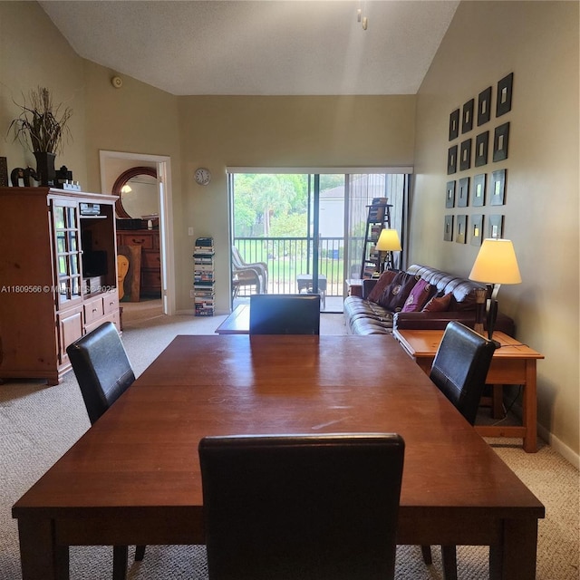 5542 Courtyard Dr Unit 5542, Margate, FL 33063 - carpeted dining room with vaulted ceiling and baseboards