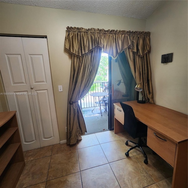 5542 Courtyard Dr Unit 5542, Margate, FL 33063 - home office with light tile patterned floors and a textured ceiling
