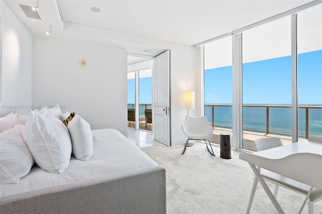 9703 Collins Ave Unit 1700, Bal Harbour, FL 33154 - carpeted bedroom with expansive windows, a water view, and attic access