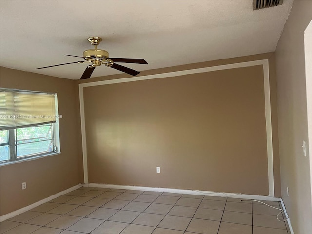 6301 Moseley St, Hollywood, FL 33024 - unfurnished room with light tile patterned flooring, ceiling fan, and baseboards
