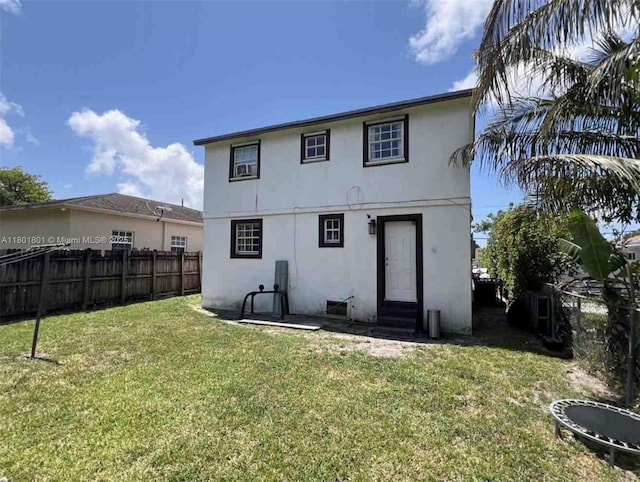 2279 NW 48th St, Miami, FL 33142 - back of property featuring entry steps and stucco siding