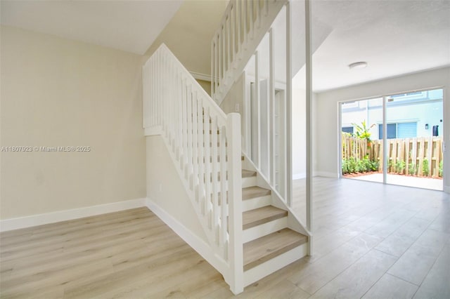 8144 NW 107th Path, Doral, FL 33178 - stairway with wood finished floors and baseboards