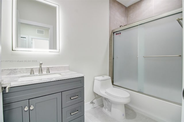 8144 NW 107th Path, Doral, FL 33178 - full bath featuring vanity, toilet, bath / shower combo with glass door, and baseboards